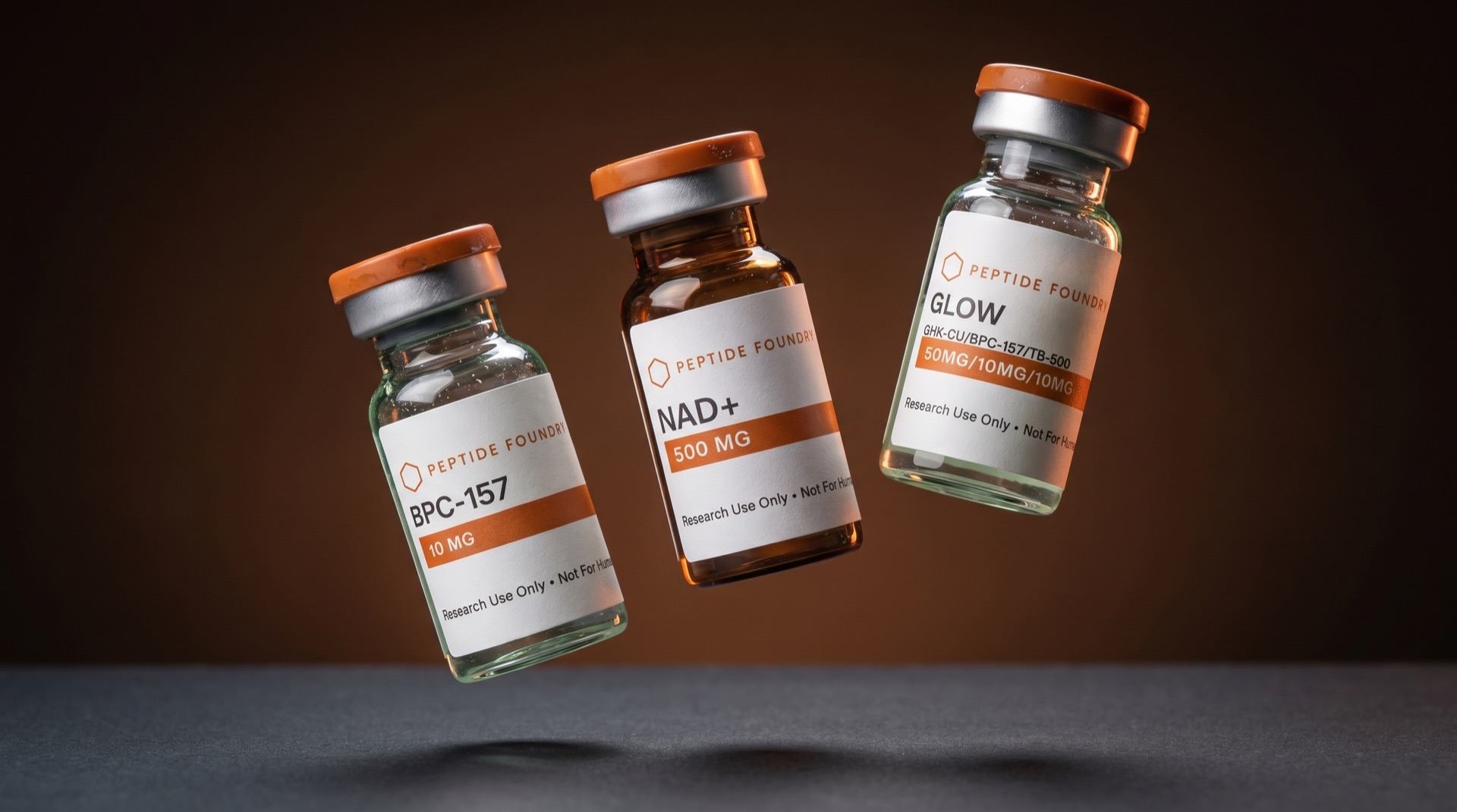 Peptide Foundry research vials — BPC-157, NAD+, and GLOW